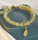 Pulseira dourada em pedras